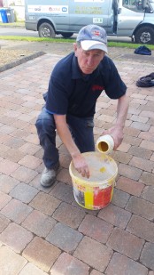 Adding the dye to the mortar to ensure the best colour match to existing finish